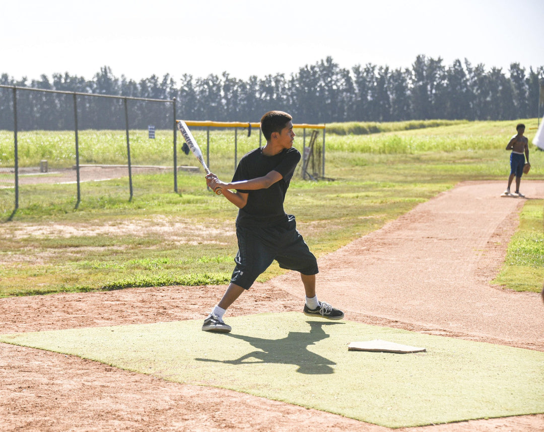 Softball Fosters Teamwork Between Students and Staff