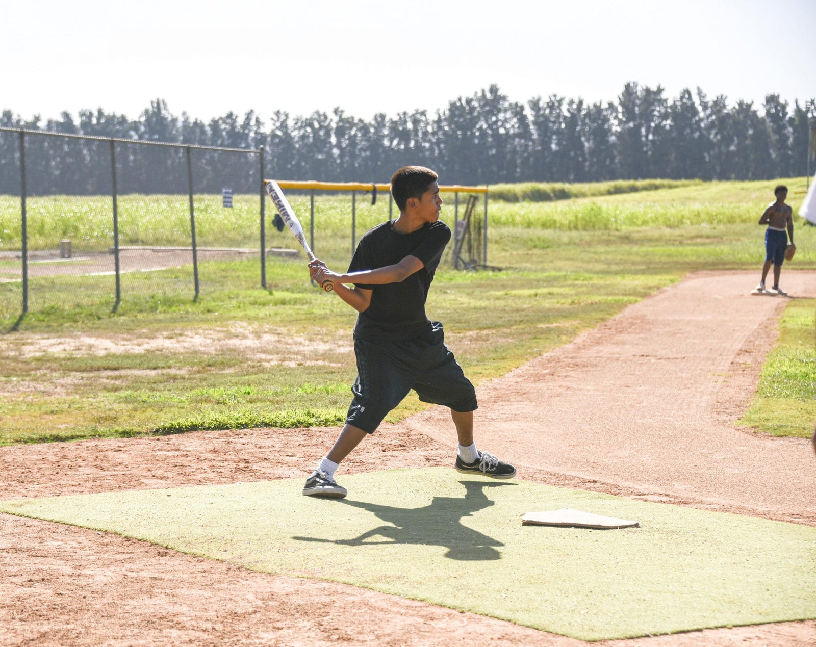 Softball Fosters Teamwork Between Students and Staff